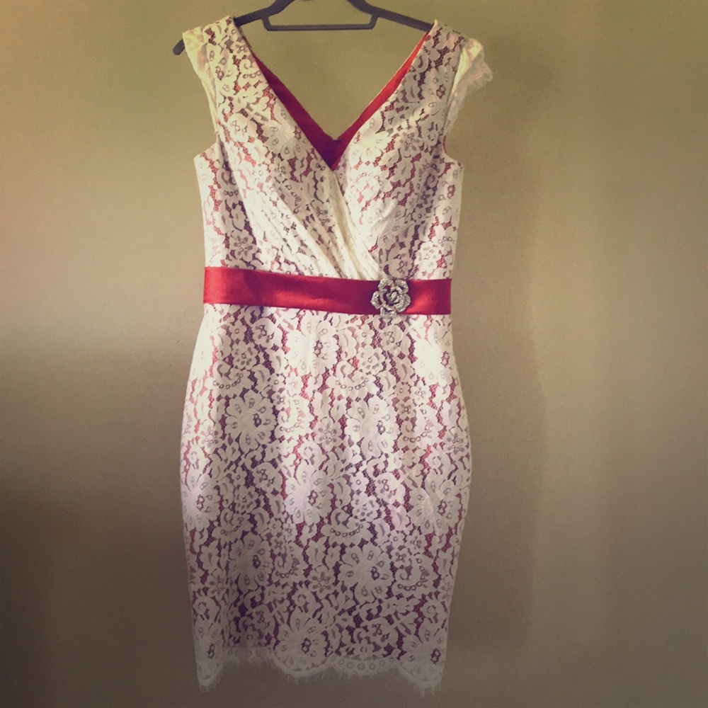 Burnt orange dress with cream lace overlay.